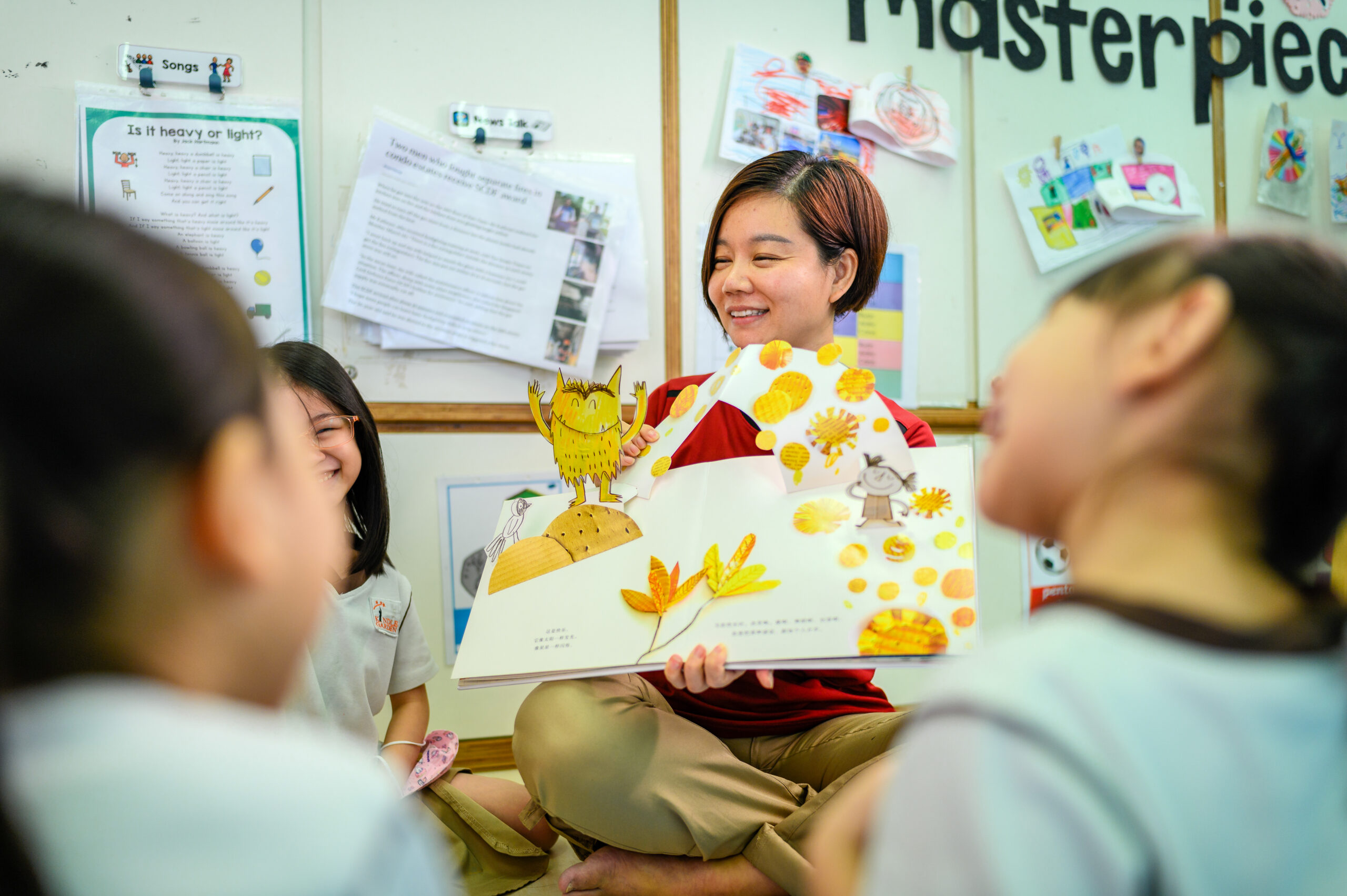 Teacher reading to children