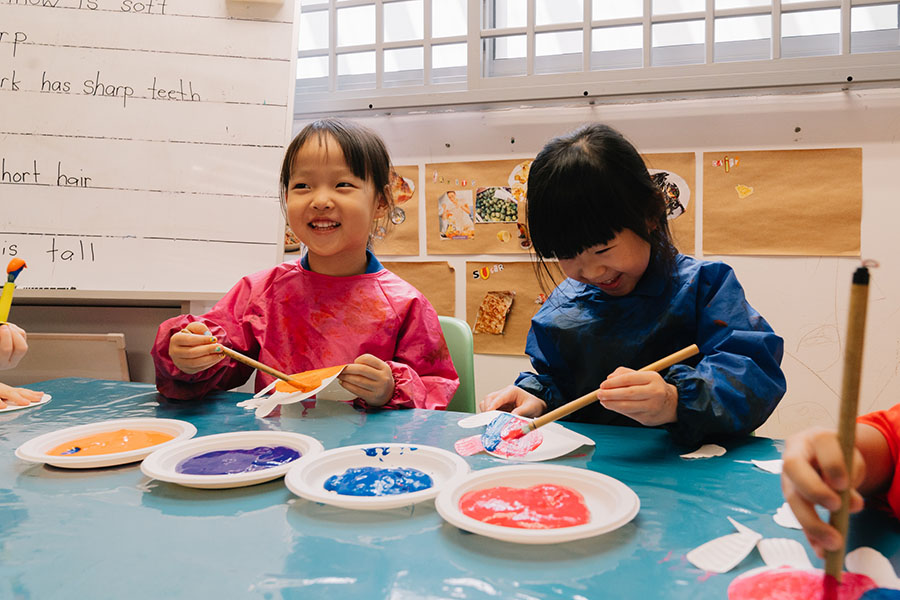 Children painting during an art activity.